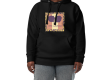 Load image into Gallery viewer, A woman wearing a black hoodie with a graphic design of woman with two afro puffs with text, "AFRO-LUXURIOUS" on the front, also featuring a hood and a front pouch pocket, with matching flat drawstrings.