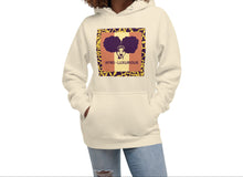 Load image into Gallery viewer, A woman wearing a sand hoodie with a graphic design of woman with two afro puffs with text, "AFRO-LUXURIOUS" on the front, also featuring a hood and a front pouch pocket, with matching flat drawstrings.