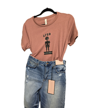 Load image into Gallery viewer, Mauve relaxed fit t-shirt with 'AFRO Elegance' text and silhouette design on the front.