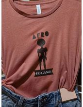 Load image into Gallery viewer, Mauve relaxed fit t-shirt with 'AFRO Elegance' text and silhouette design on the front.