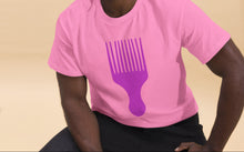 Load image into Gallery viewer, Man wearing a pink t-shirt with a vivid pink afro pick design on a beige back