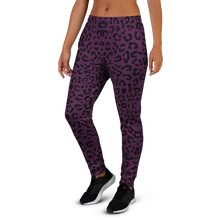 Load image into Gallery viewer, Purple leopard print leggings worn by a person on no background