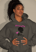 Load image into Gallery viewer, Minding My Black Bizness Hoodie by ClarkieShop — modern typography design symbolizing focus, confidence, and independence. Woman wearing Gray hoodie with a black silhouette and text design.