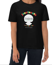 Load image into Gallery viewer, woman wearing a black t-shirt with TASHA branded Juneteenth colorful text and logo on a white background