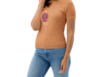 Load image into Gallery viewer, Woman wearing a caramel long-sleeve shirt with a purple graphic design on a white background
