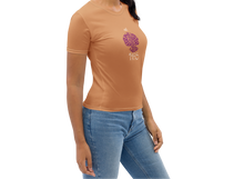Load image into Gallery viewer, Woman wearing a caramel t-shirt with a purple graphic design on a white background