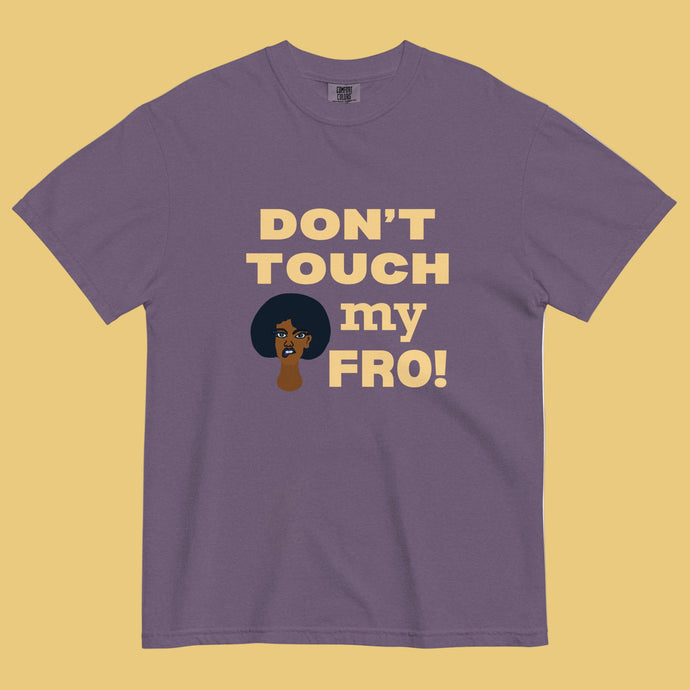  Don’t Touch My Fro Hoodie by ClarkieShop — bold graphic afro design celebrating natural hair and self-respect. Purple t-shirt with 'Don't Touch My Fro!' text and graphic.