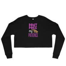 Load image into Gallery viewer, Black long-sleeve crop top with pink text &#39;DON&#39;T POKE MY PATIENCE&#39; on a white background

