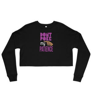 Black long-sleeve crop top with pink text 'DON'T POKE MY PATIENCE' on a white background