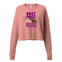 Load image into Gallery viewer, Pink sweatshirt with purple text, DON&quot;T POKE MY PATIENCE&#39; and graphic.
