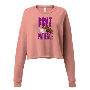Pink sweatshirt with purple text, DON"T POKE MY PATIENCE' and graphic.