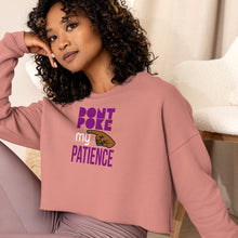 Load image into Gallery viewer, A woman wearing a black crop sweatshirt with text, &#39;DON&quot;T POKE MY PATIENCE&#39; on it, posing with one hand against her cheek.
