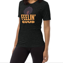 Load image into Gallery viewer, Radiate good energy in the Feelin’ Guud tee or hoodie—soft, joyful, and stylish essentials that keep your vibe lifted all day. Woman wearing a black t-shirt with &#39;FEELIN&#39; GUUD&#39; text and graphic.
