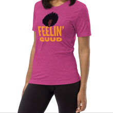 Load image into Gallery viewer, Radiate good energy in the Feelin’ Guud tee or hoodie—soft, joyful, and stylish essentials that keep your vibe lifted all day. Woman wearing a pink t-shirt with &#39;FEELIN&#39; GUD&#39; text and graphic.
