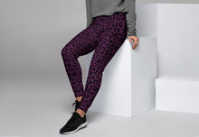 Load image into Gallery viewer, Woman wearing a gray sweatshirt and purple leopard print leggings against a gray background
