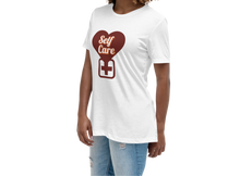 Load image into Gallery viewer, Woman wearing a white t-shirt with a red heart and text design on a white background
