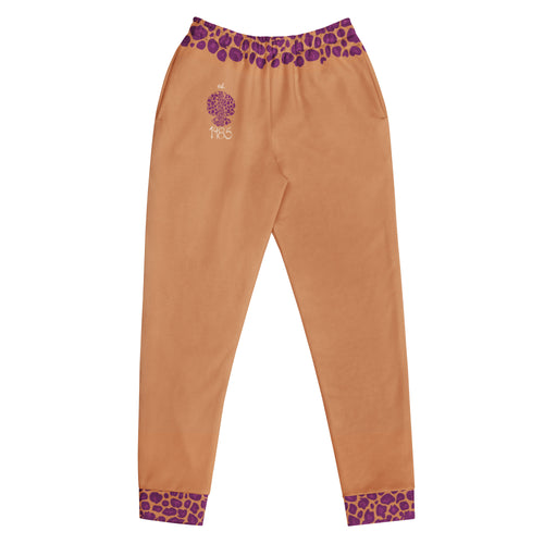 Caramel color pants with purple leopard print patterned waistband and cuffs on a white background