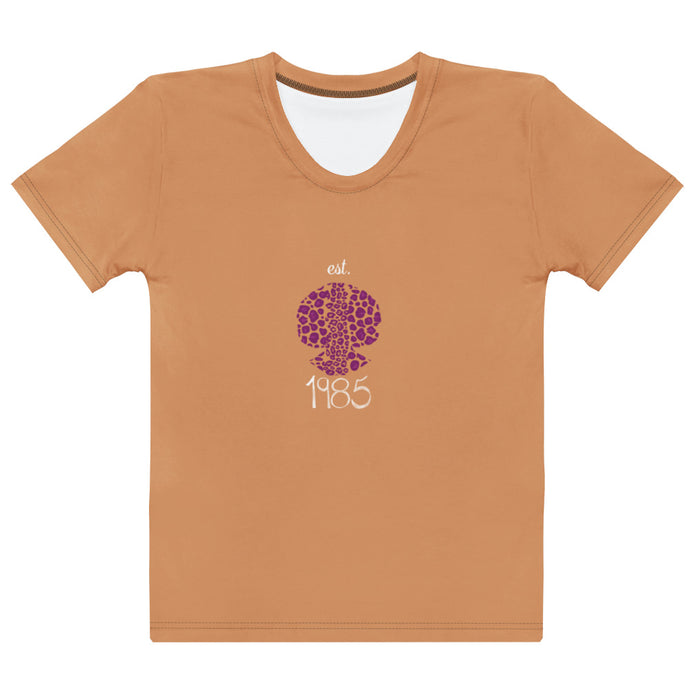Caramel color t-shirt with a purple and white graphic design on a white background